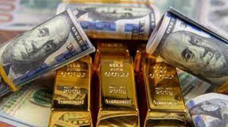 الذهب يرتفع وصعود الدولار يحد من المكاسب